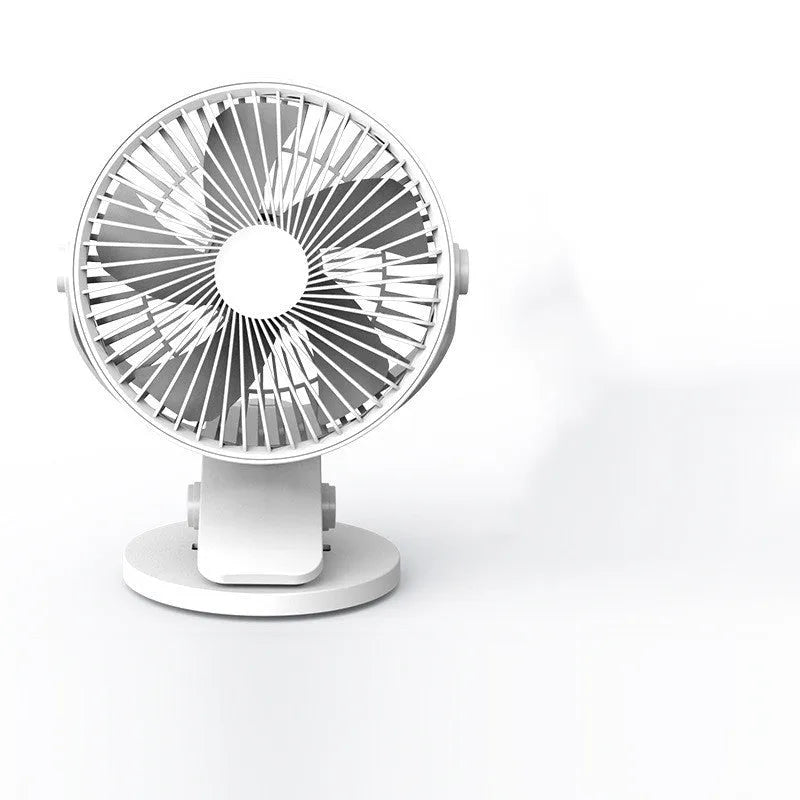 USB mini clip fan in green with clip base on wooden desk showing 135mm blade