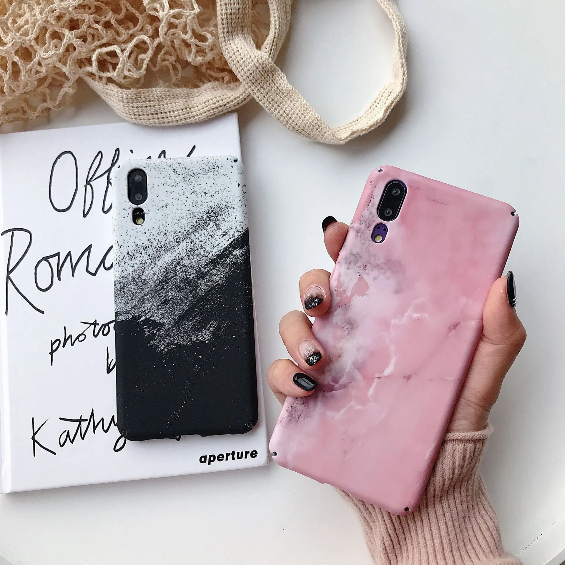 Painted black and pink mobile phone back cover cases for Huawei and Honor models.