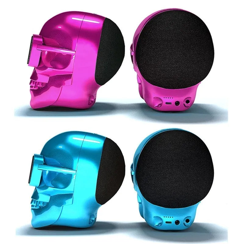 Skull-shaped wireless Bluetooth speaker with rechargeable battery showing front detail and colour options