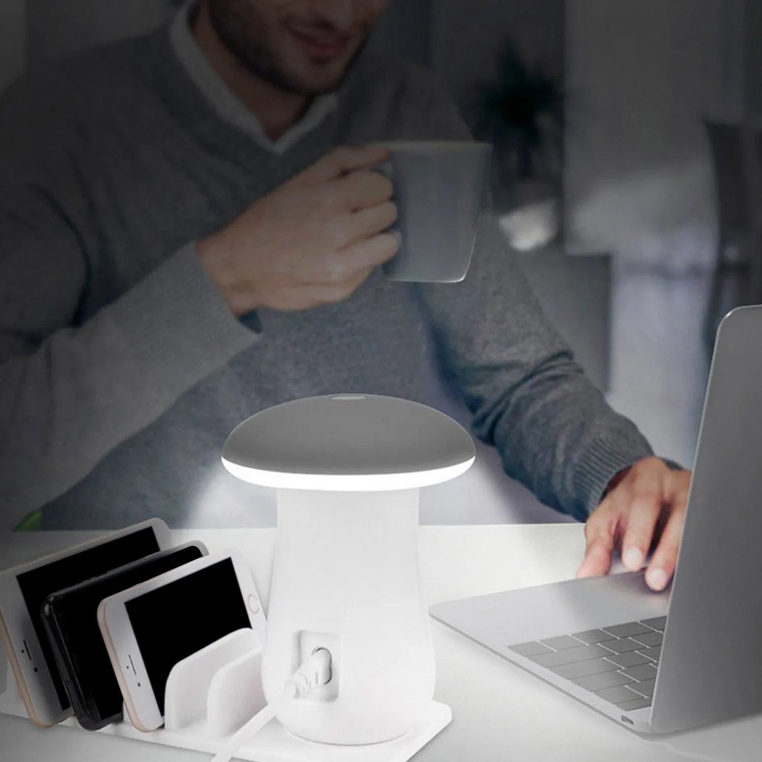 White glossy mushroom-shaped LED desk lamp with a built-in 5-port USB charging station for smartphones and tablets.