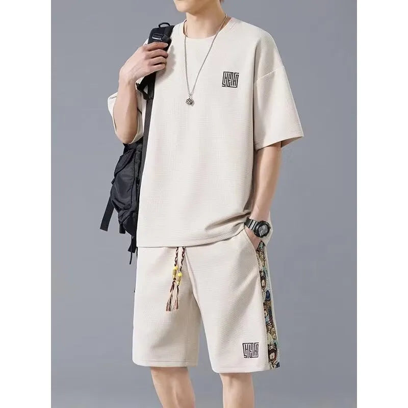 Waffle embroidery two-piece set with short sleeve top and shorts in thin polyester, sports style, black white green apricot