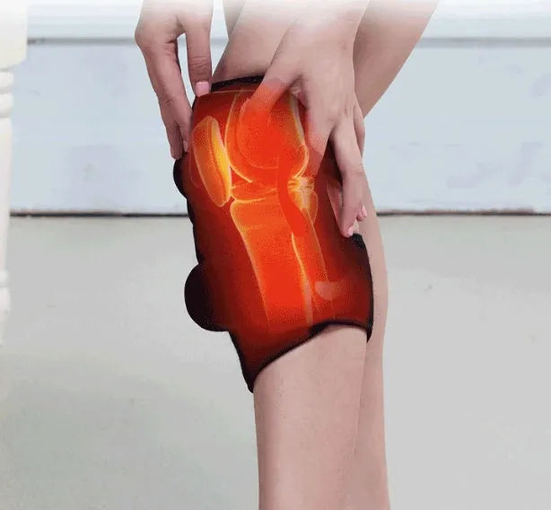 Electric infrared heating knee massager wrap with vibration and rechargeable battery on a knee joint