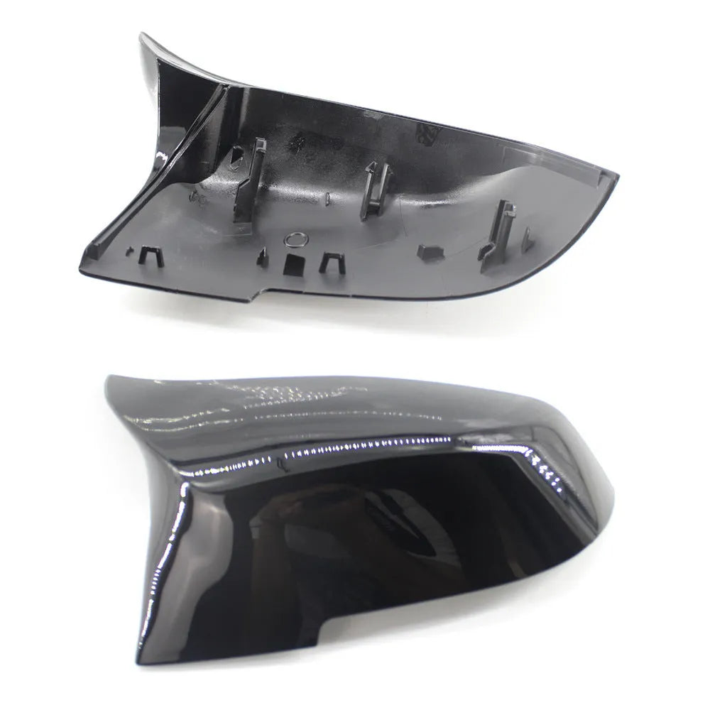 Pair of paint bright black horn-style BMW rearview mirror shells for F30 3 Series.
