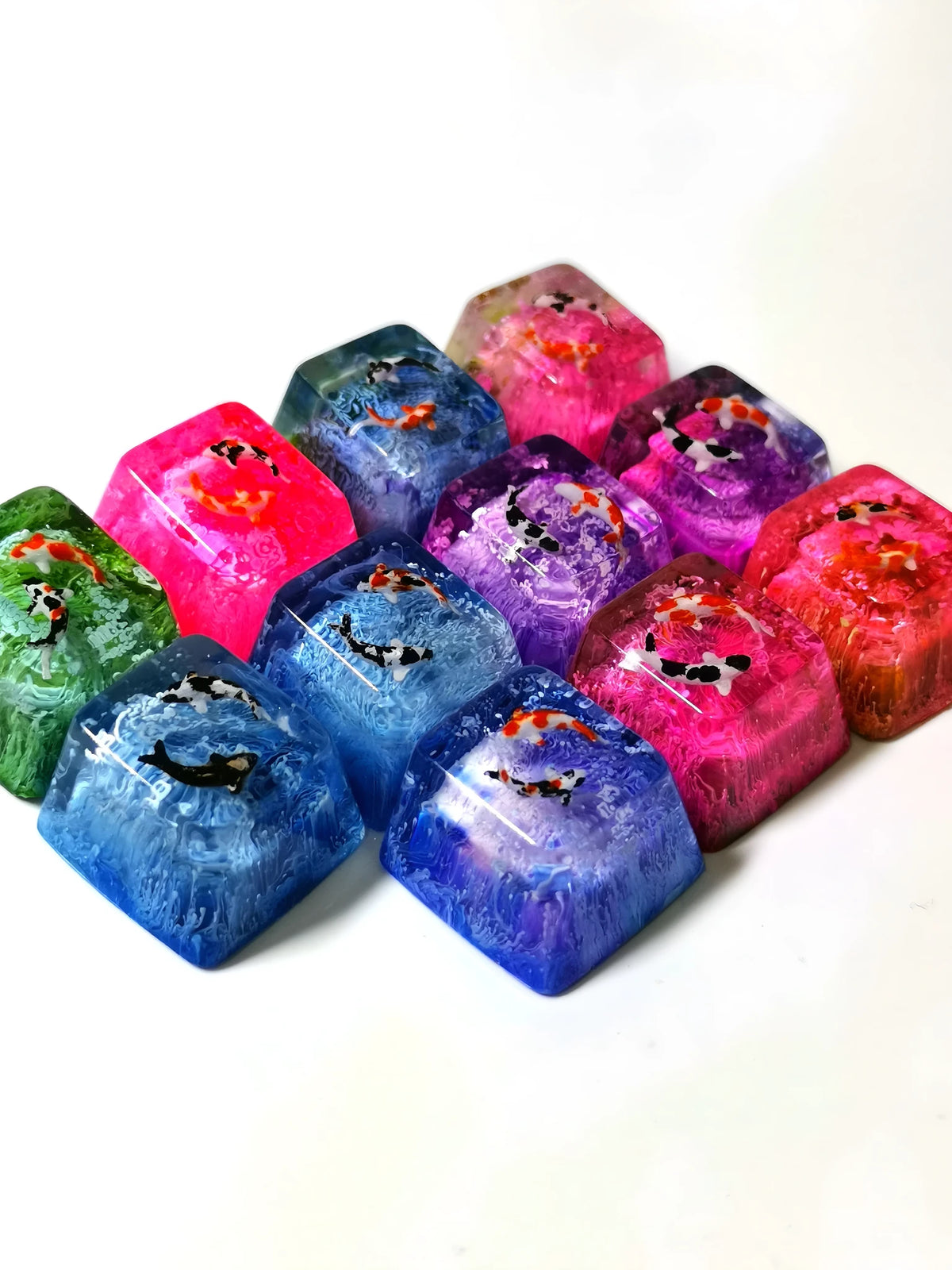 Koi resin mechanical keyboard keycap for MX cross axis switches, OEM R4 ESC height, available in six colours.