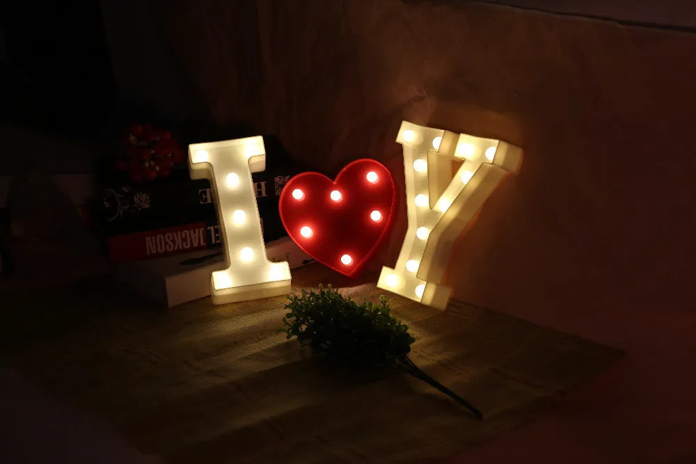 White plastic LED marquee sign letter lamp, 22 cm high, with warm white glow and battery compartment