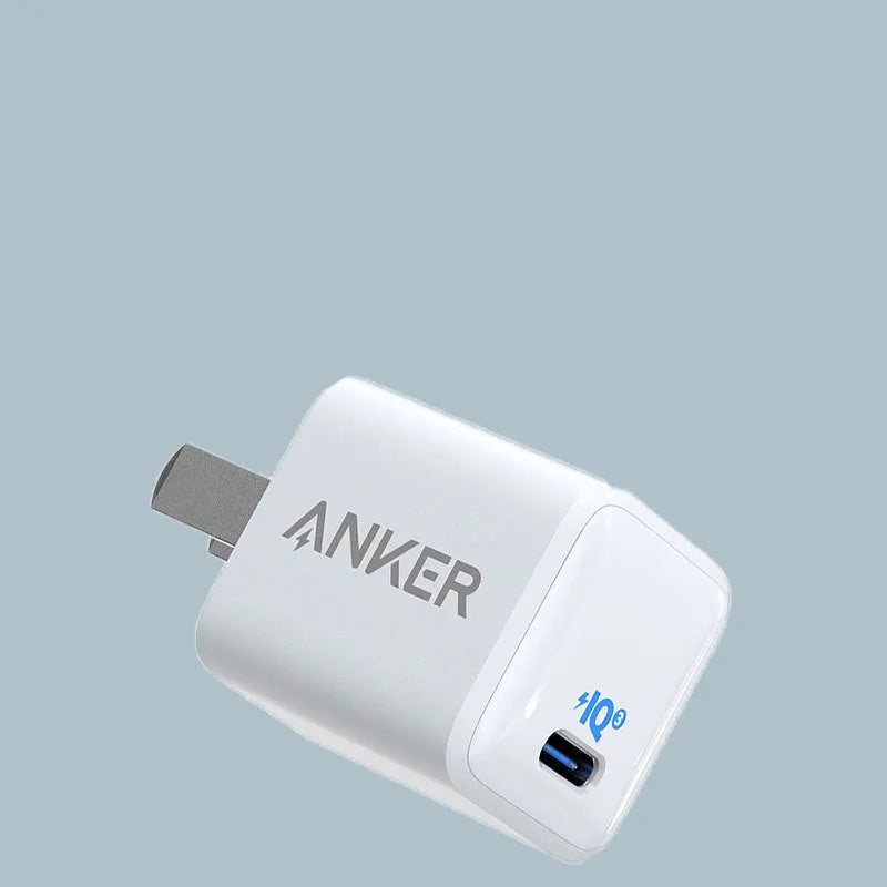 White 18W USB travel charger for mobile phones with fast charging capability