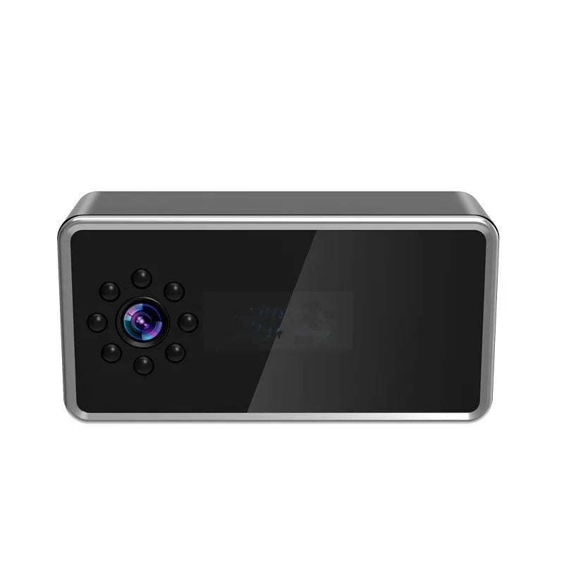 Wireless network surveillance camera showing front view with lens and compact rectangular housing