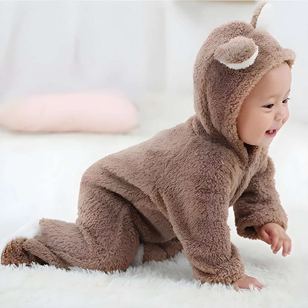Unisex baby winter romper in cotton blend, O-neck pullover, available in eight colours and sizes 0 3M to 9 12M.