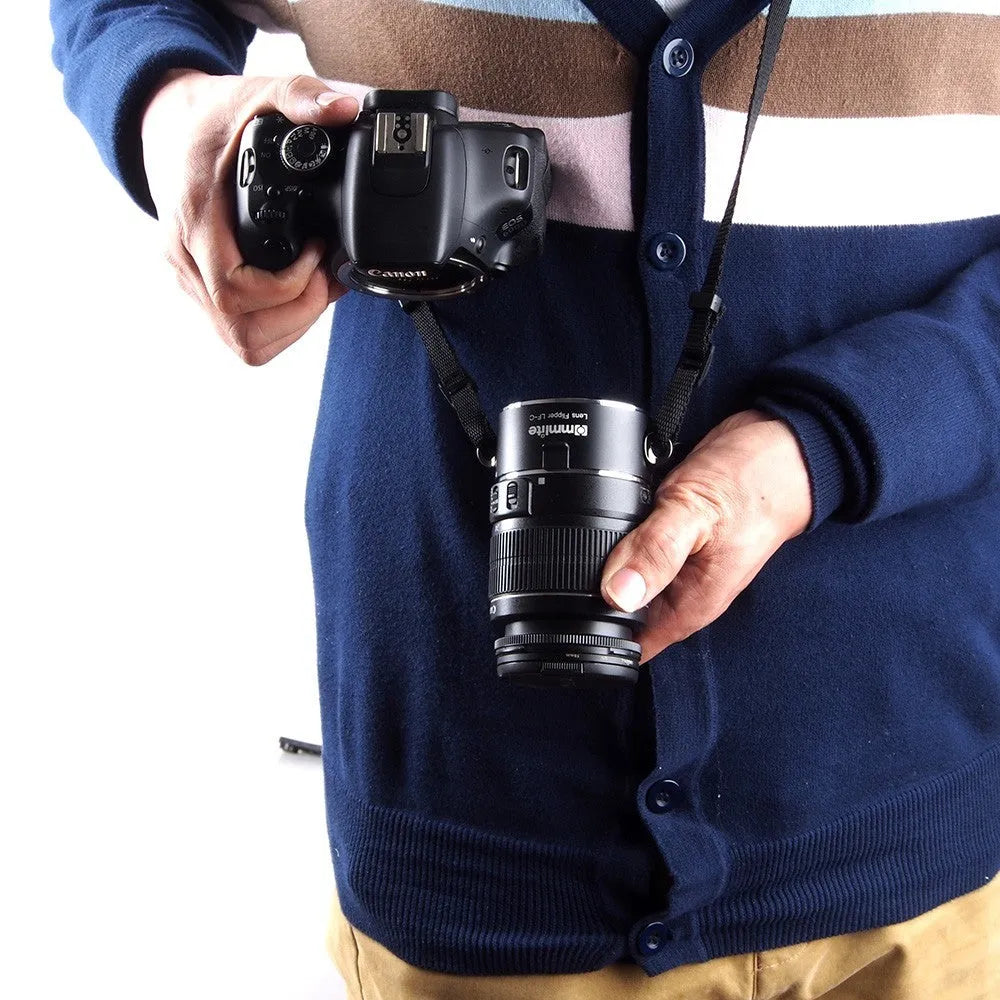 Aluminium camera lens flipper holder with cotton shoulder strap for Canon, Nikon, or Sony cameras.