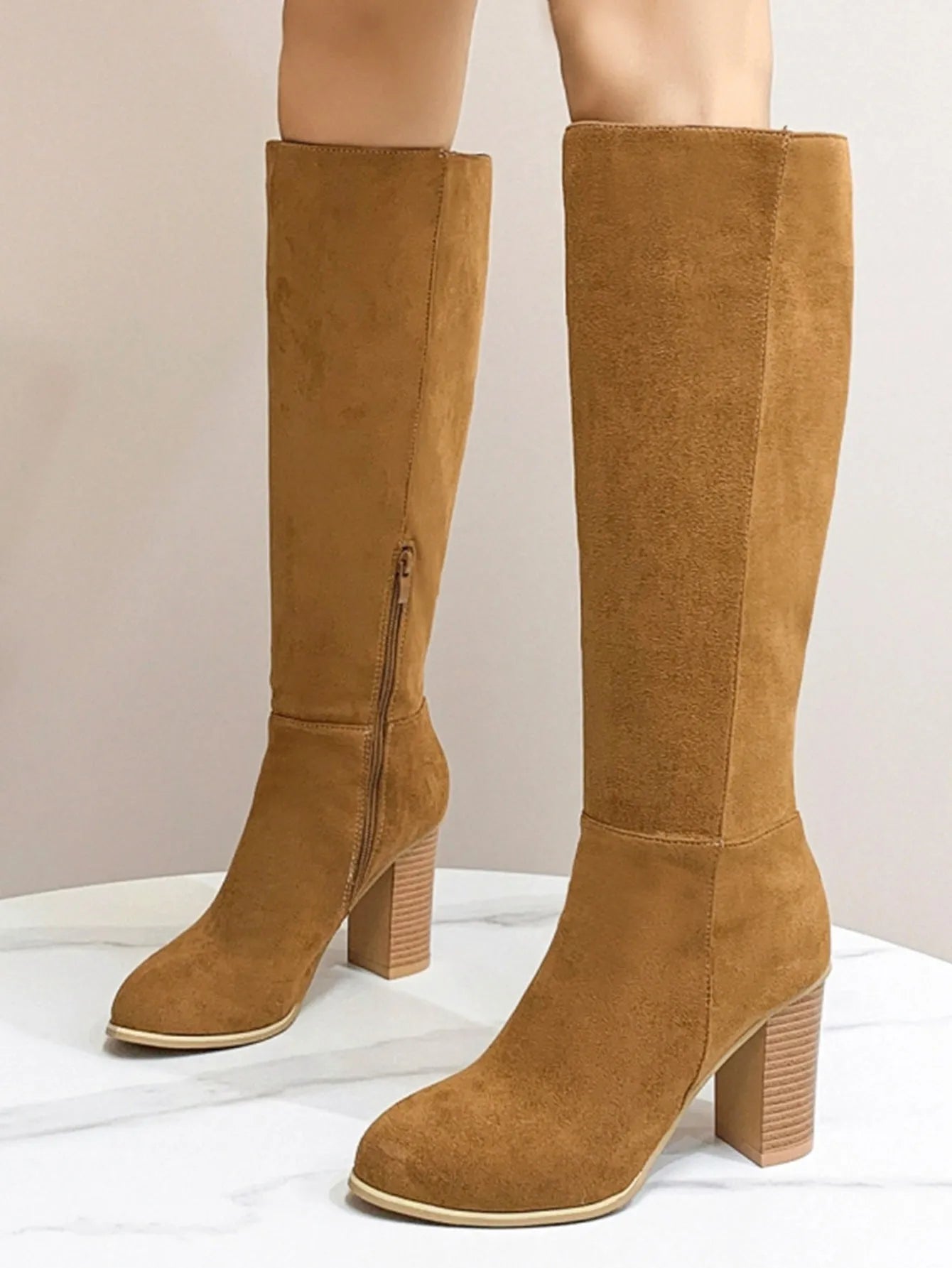 Women's black square toe high heel fashion boot with a casual style artificial PU upper.