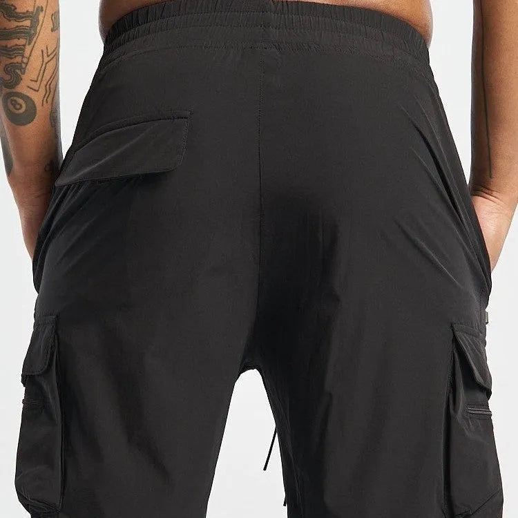 Men's black sports shorts with elastic waistband for fitness activities