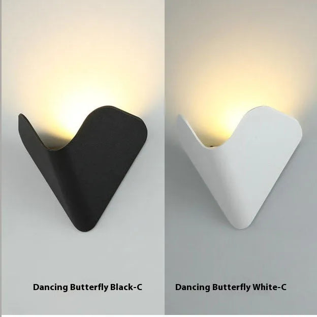 Black and white aluminium alloy waterproof IP65 LED lamp for courtyard and indoor use.