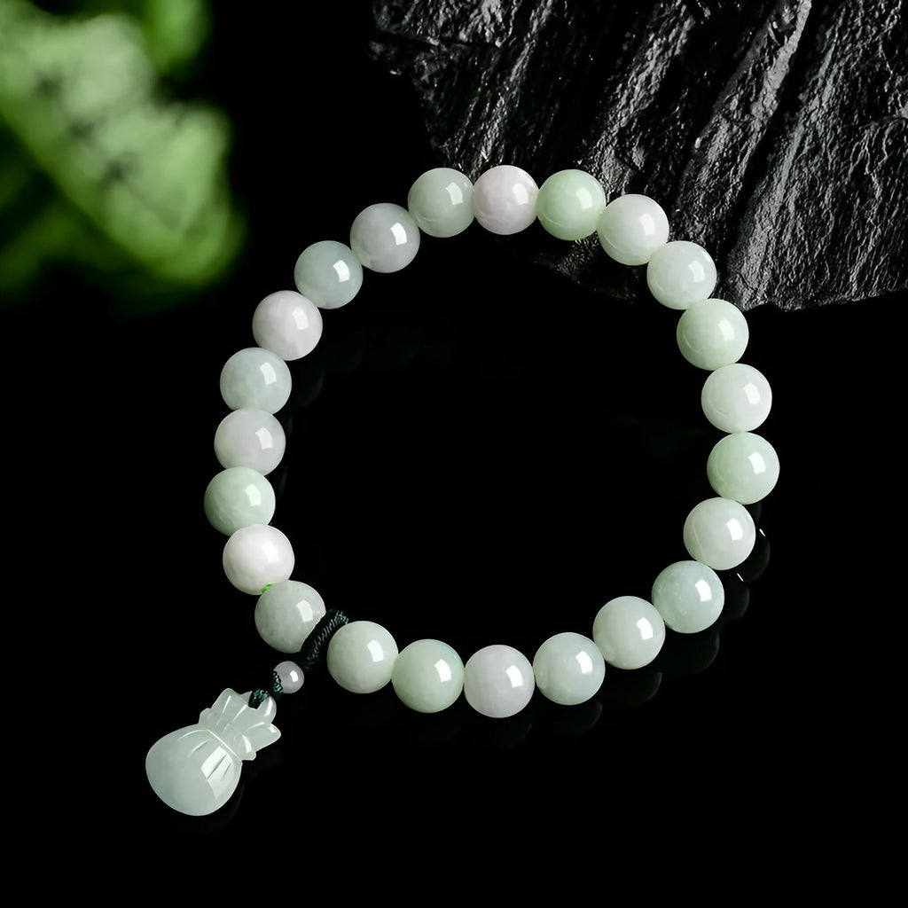 Jade purse bracelet with 8mm floral beads on wrist, traditional Chinese unisex design