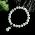 Jade purse bracelet with 8mm floral beads on wrist, traditional Chinese unisex design