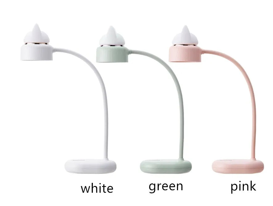 White clip-on LED desk lamp with touch controls and built-in battery attached to desk edge