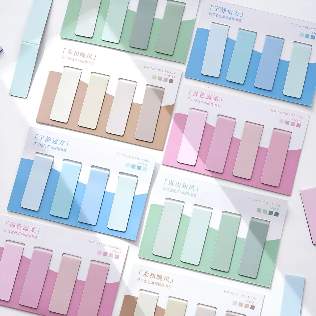 Set of four magnetic morandi colour block bookmarks in soft pastel hues on a page