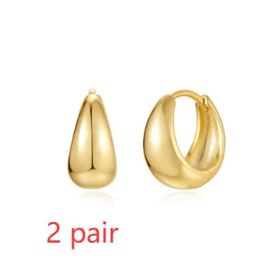 Brass diamond earclip earrings with geometric round design and gold electroplated finish