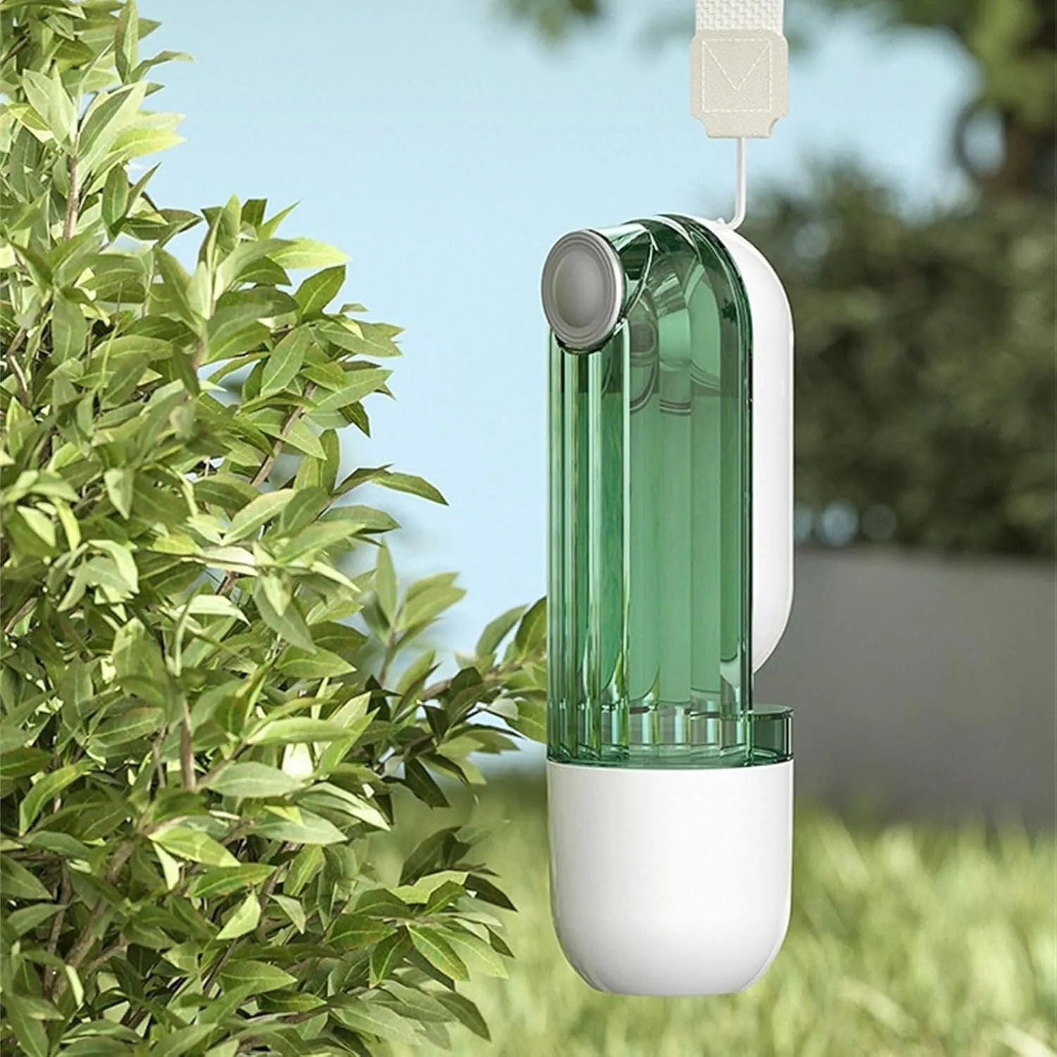 Beige foldable dog water bottle with food dispenser base for outdoor walking and travel