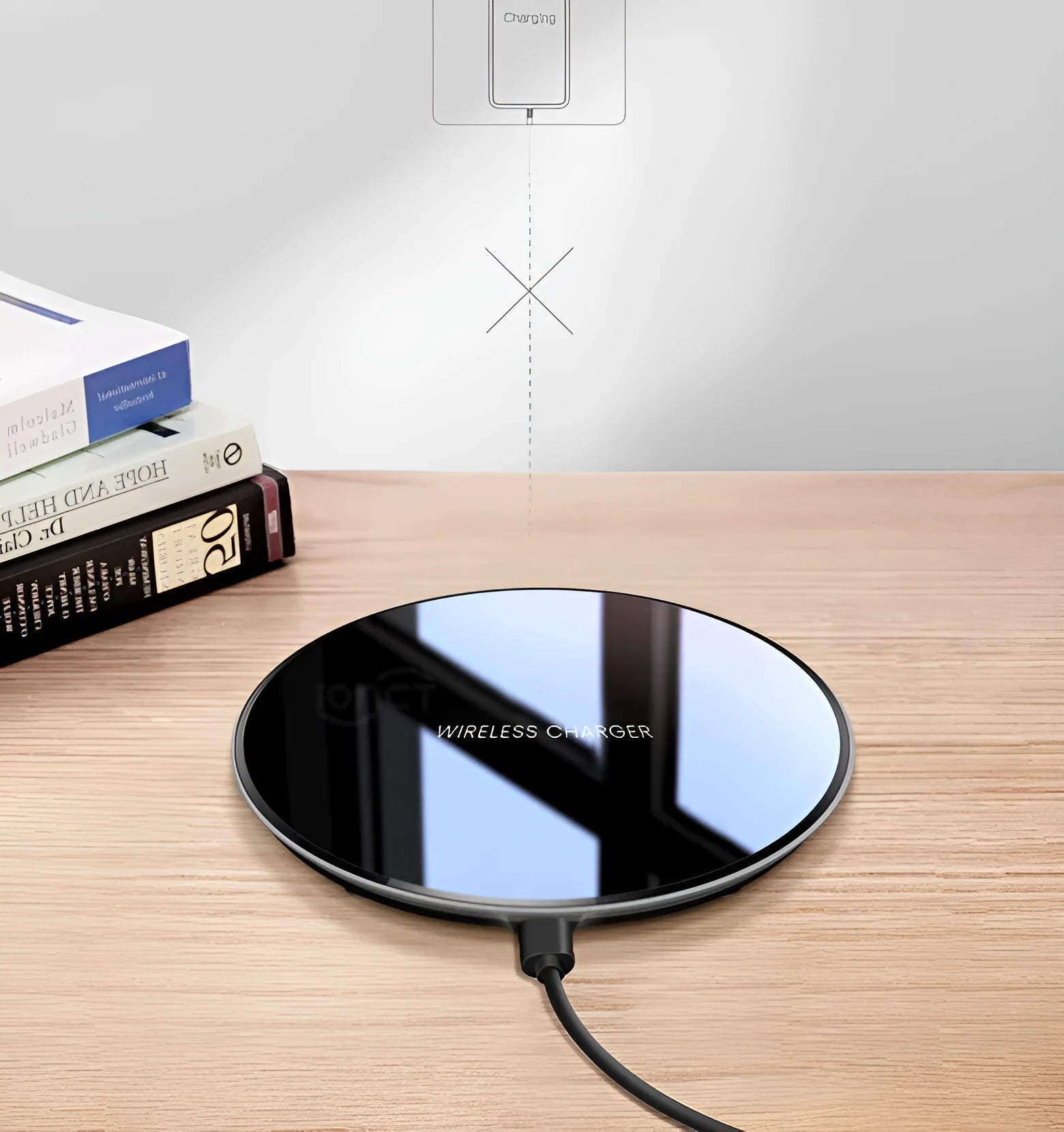 Black QI wireless charging pad with a smooth plastic surface and silicone non-slip base.