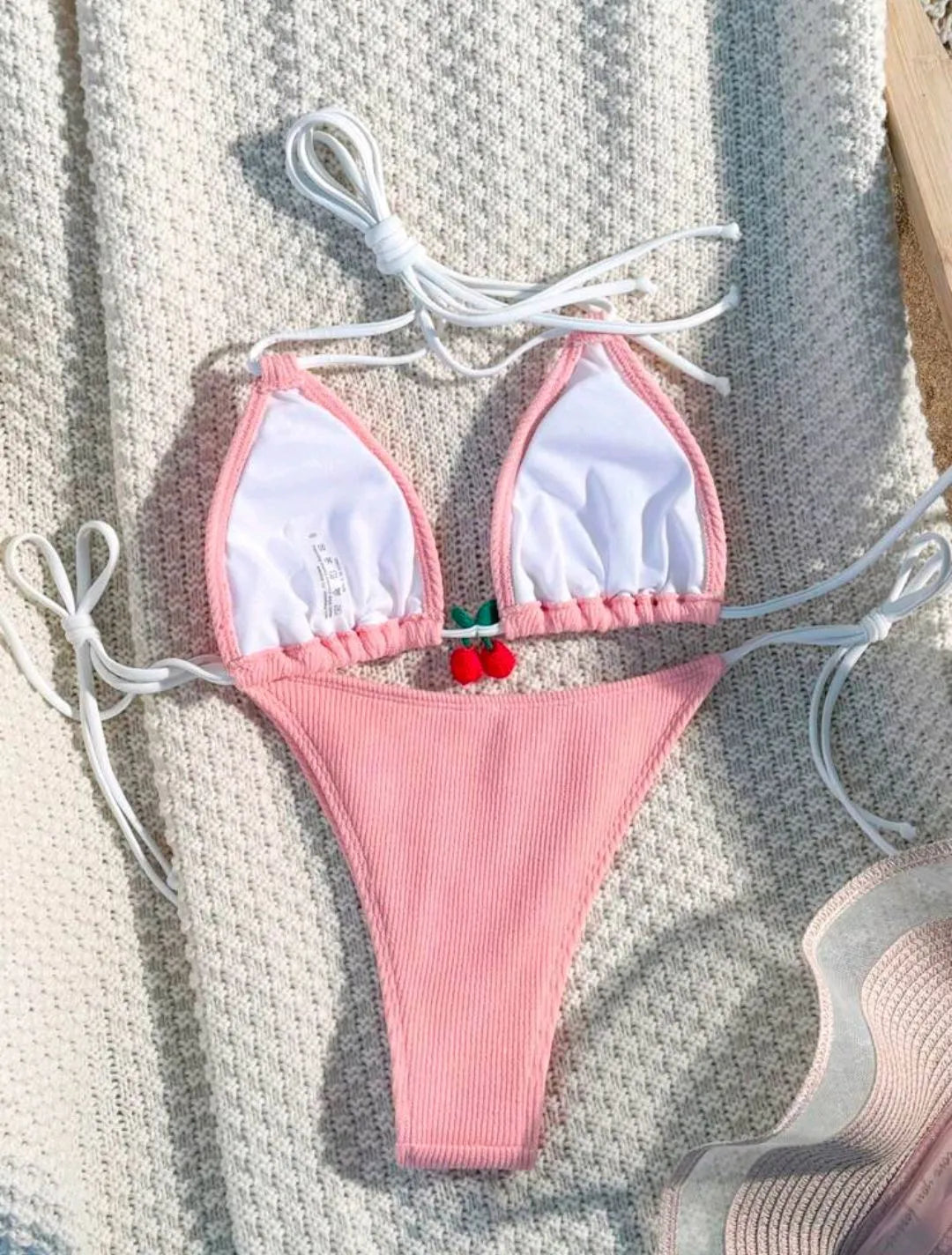 Solid colour nylon bikini briefs swimsuit in briefs style on a mannequin.