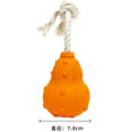 Durable natural rubber dog toy for small medium breeds, shown with a longer strap for fetch.
