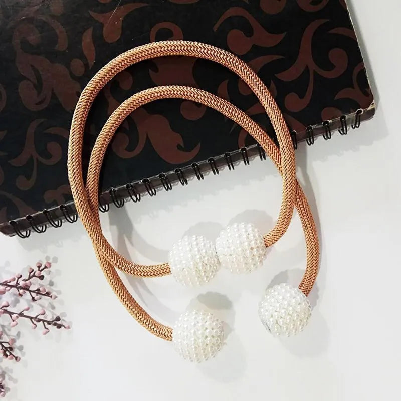 Magnetic curtain tiebacks with pearl beads in multiple colour options on white background