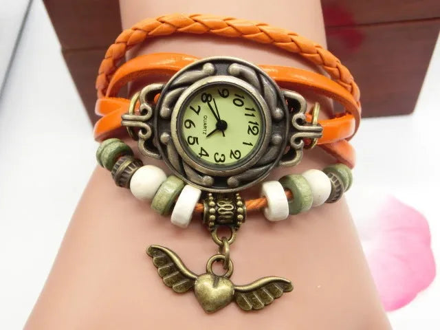 Vintage casual flying heart pendant bracelet belt watch with round 22.5mm dial and PU strap in multiple colours