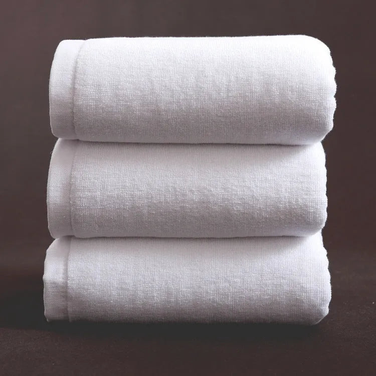 White thickened cotton bath towel measuring 100x200cm weighing 800g with plain weave texture