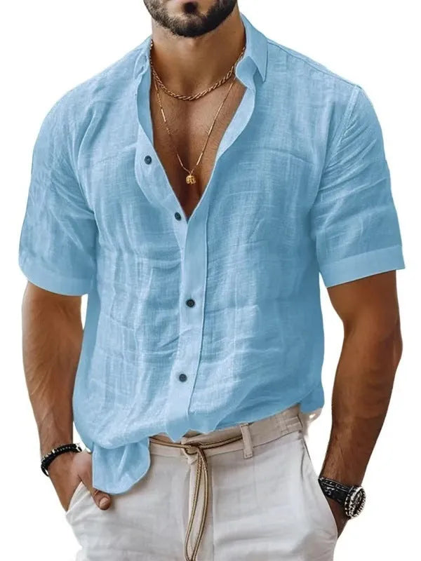 Men's solid colour short sleeve lapel shirt in light green shown on a hanger