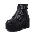 Black women's punk gothic short ankle boots with a bat buckle and side zip.