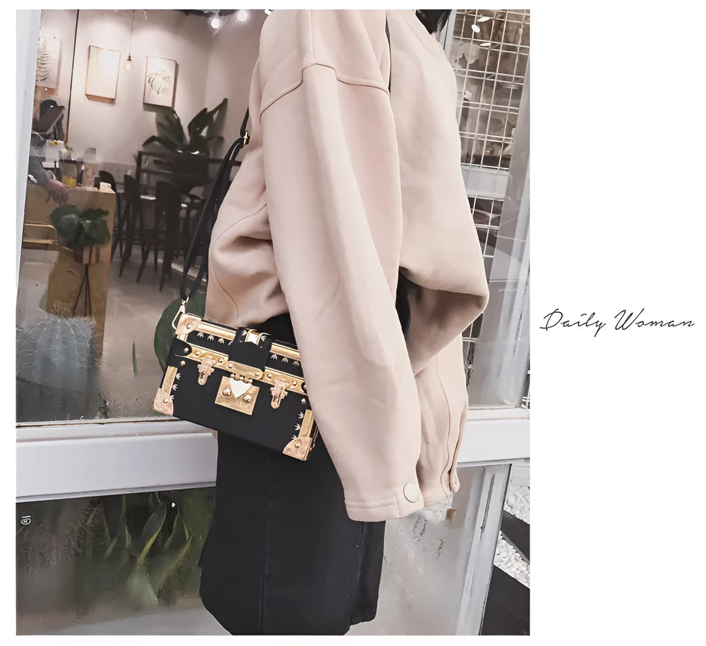 Women's hard PU leather shoulder bag with single adjustable strap and flap closure