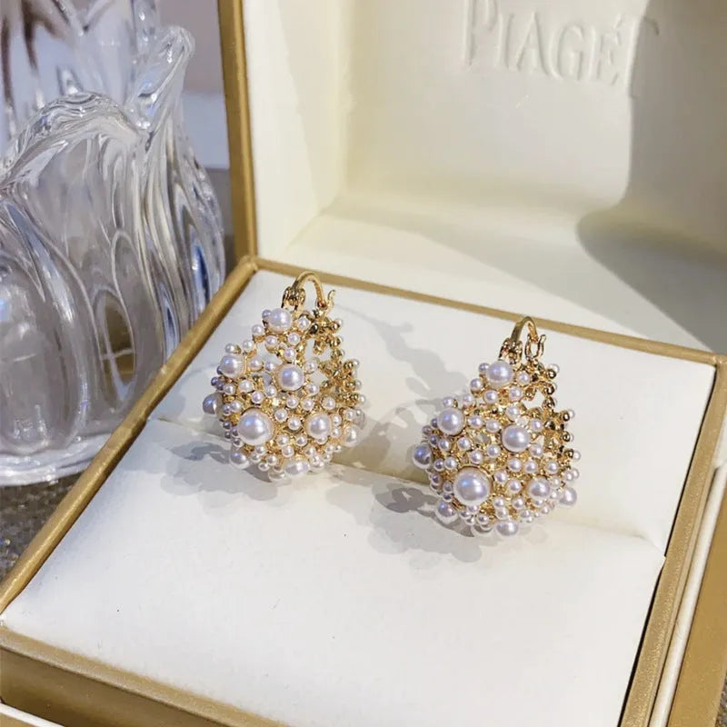 Women's gold flower basket earrings with pearl inlay on small rice-shaped beads