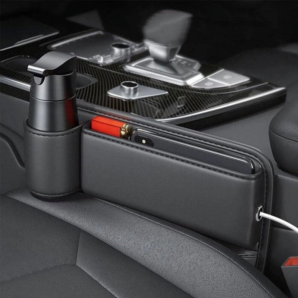 Car seat gap storage box with cup holder in black PU leather and ABS plastic fitted between car seat and centre console