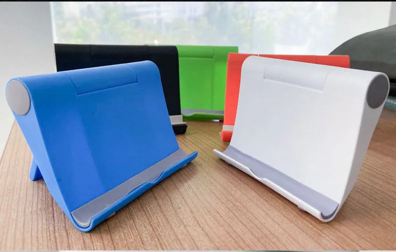 PE folding tablet and mobile phone stand in an adjustable open position on a desktop.