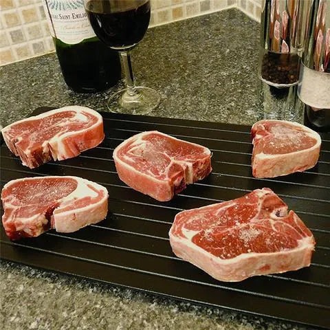 Black aluminium quick defrosting tray for thawing frozen meat without electricity
