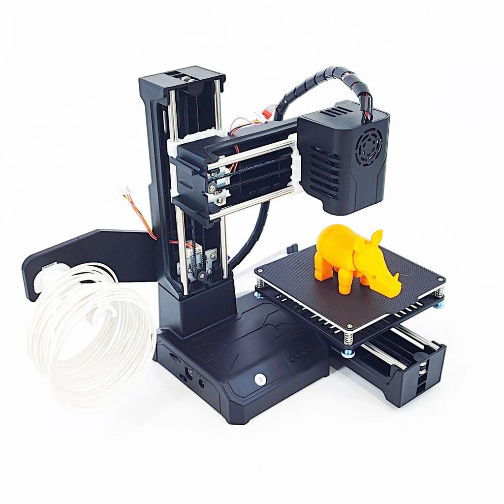 K9 mini 3D printer on a desk with small printed PLA model next to it.
