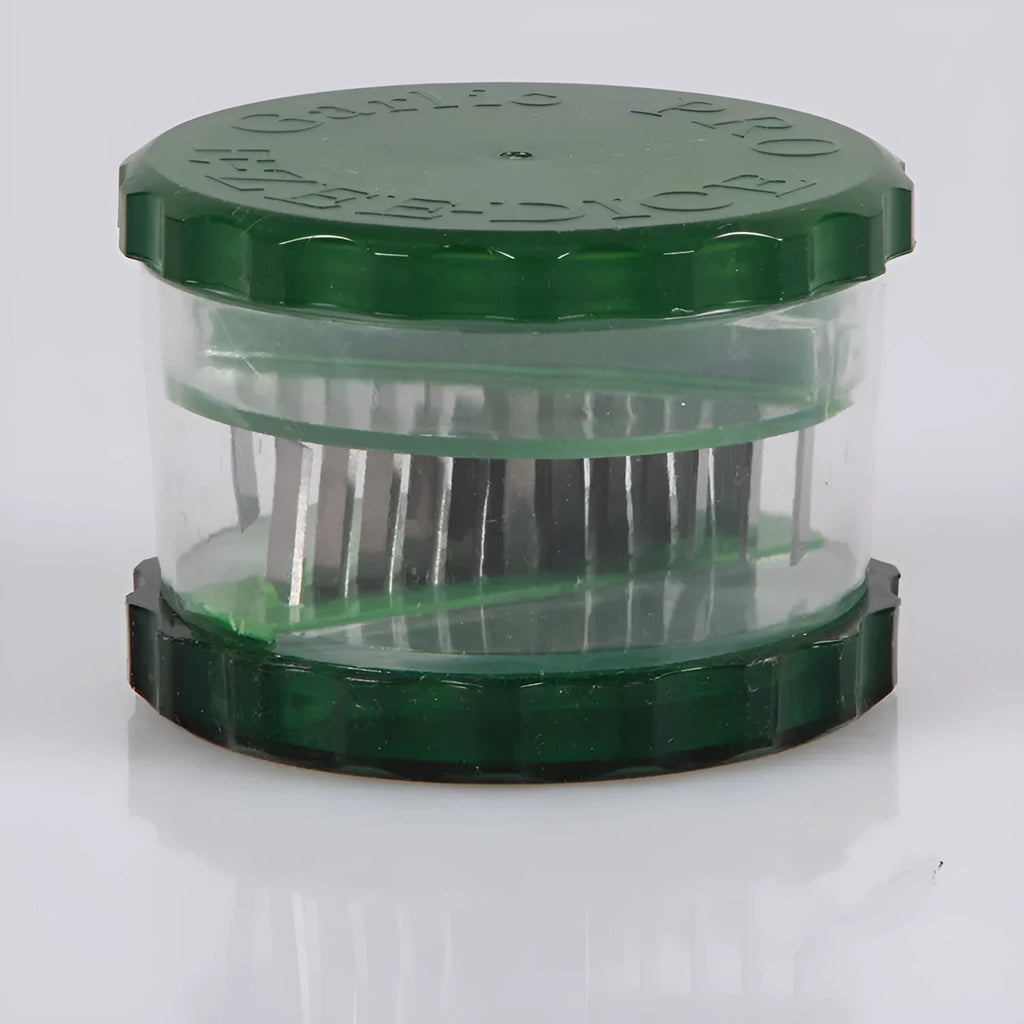 Green transparent silicone garlic peeler tube on a kitchen counter
