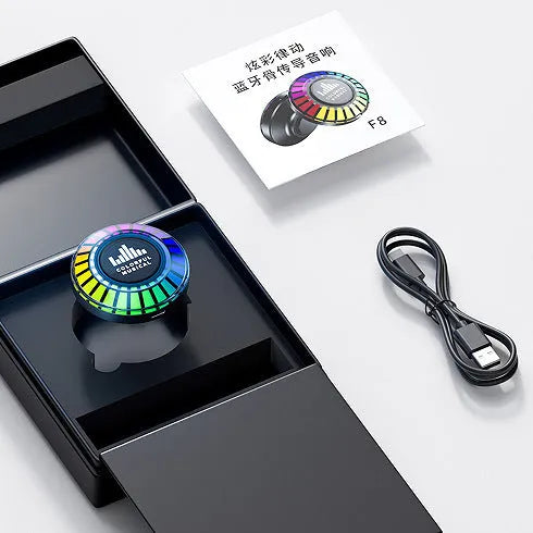 Small white cube-shaped voice control Bluetooth ambience lamp projecting polar light pattern.