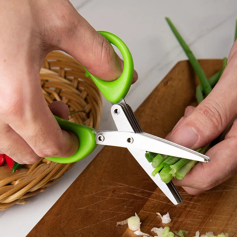 Green multi-layer stainless steel kitchen scissors for cutting herbs and green onions.