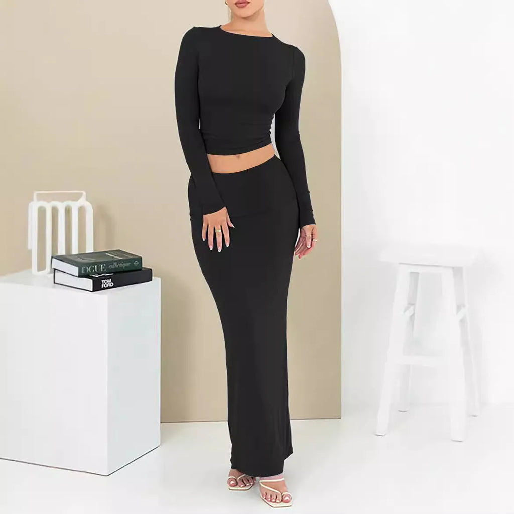Women's pure colour slim fit two-piece suit with long skirt and three-quarter sleeve top for autumn.