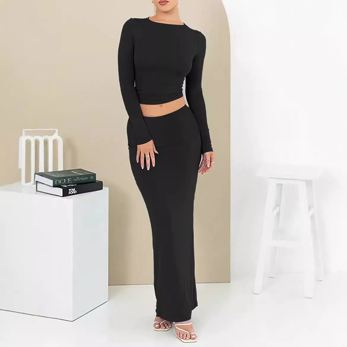 Women's pure colour slim fit two-piece suit with long skirt and three-quarter sleeve top for autumn.