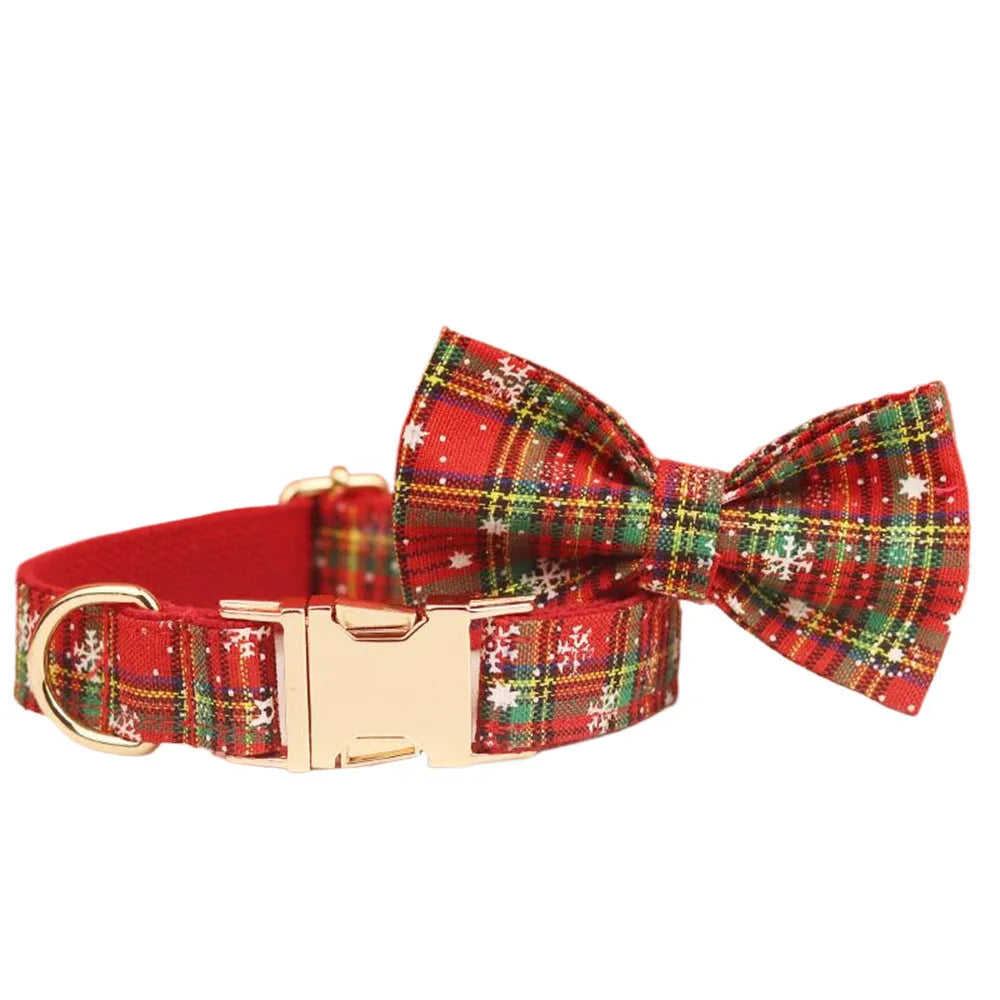 Red Christmas dog collar and leash set with snowflake design, plaid rope, floral bows, and matching vest