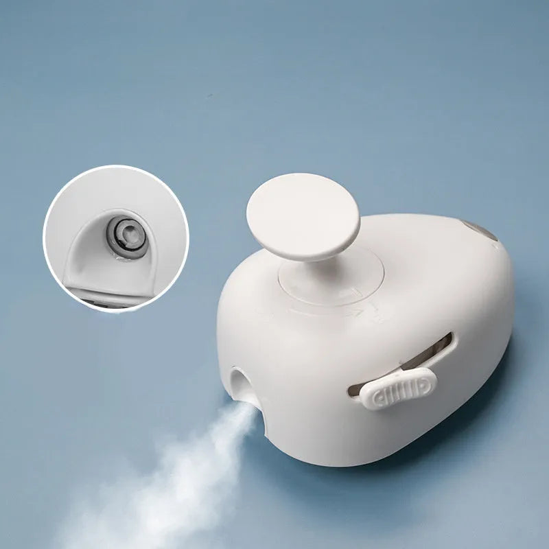 Self-cleaning cat steam brush with water mist spray for shedding removal