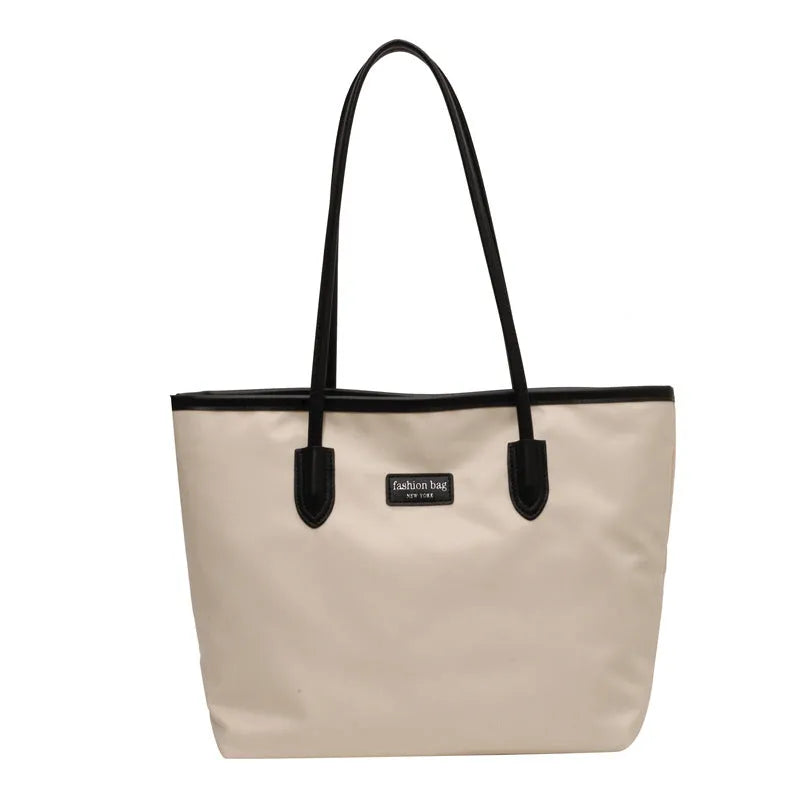 Large capacity women's shoulder bag in black oxford cloth with double straps and hidden pocket, vertical square shape
