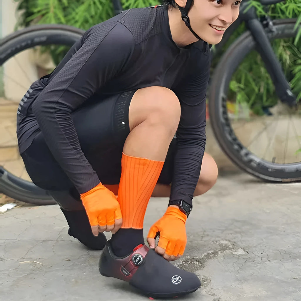 Pair of breathable athletic sports socks for cycling and running in a chemical fibre blend fabric.