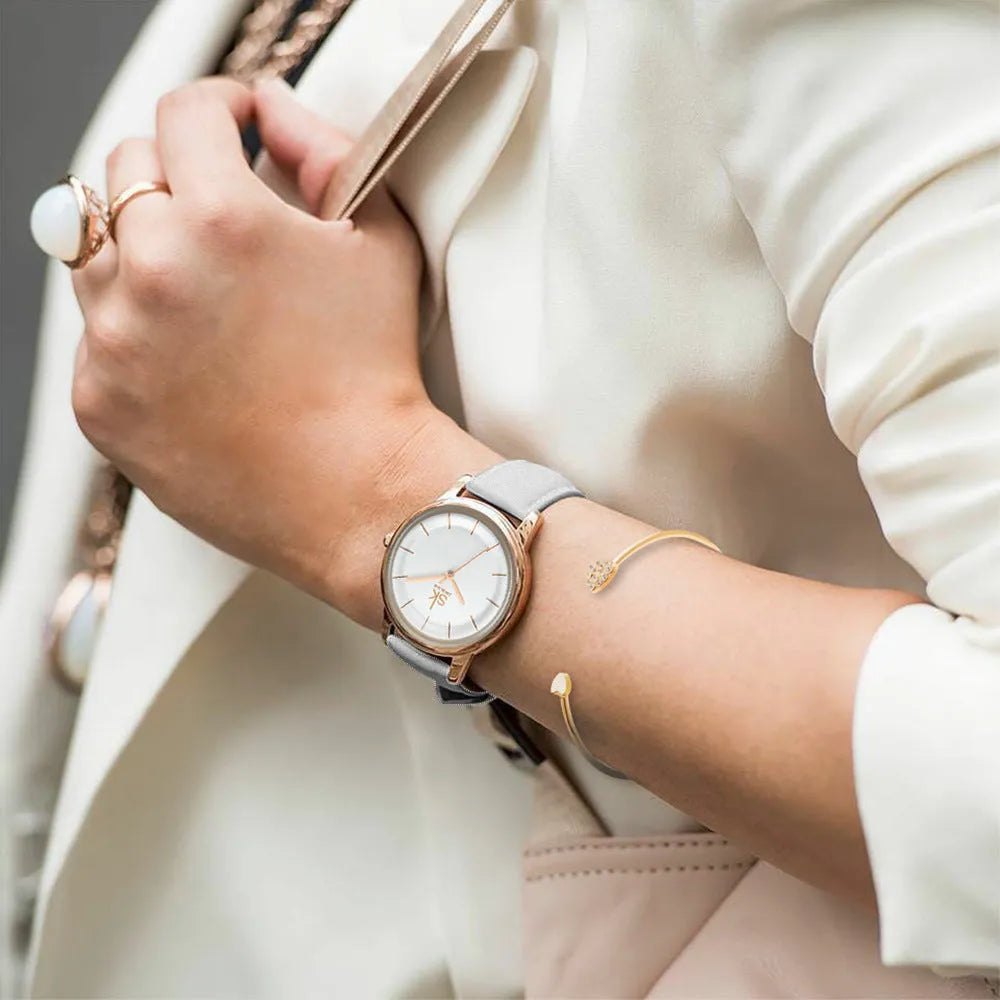 Rose gold alloy case women's quartz watch with white PU strap and round 38mm dial