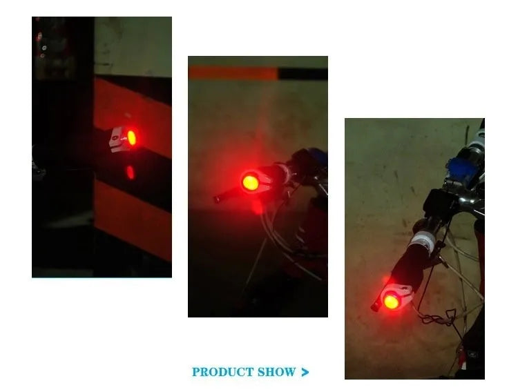 A pair of anodised aluminium bicycle handlebar end lights in a choice of colours, showing the red LED and white rubber switch.