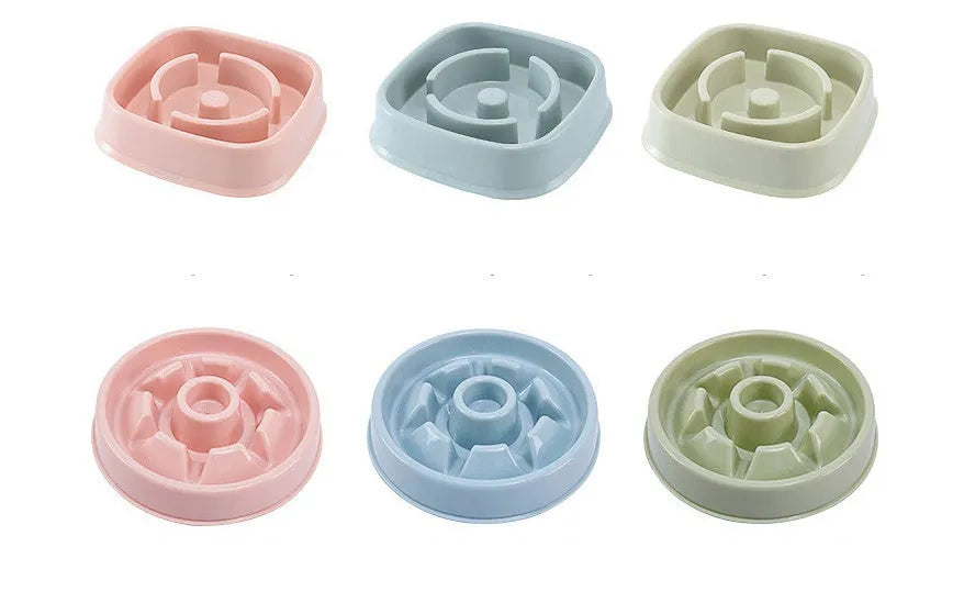 Plastic slow food bowl for dogs and cats with flower-shaped internal obstacles, pink colour, choke prevention design.