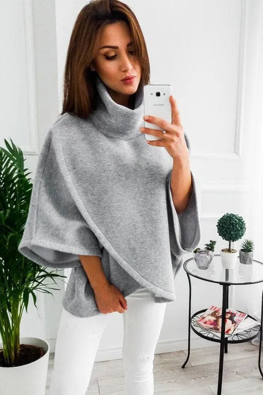 Women's longline batwing sleeve cardigan in fake two-piece style with button placket