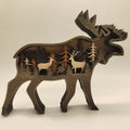 Boxwood Christmas elk ornament 18cm tall with natural wood grain on a wooden shelf